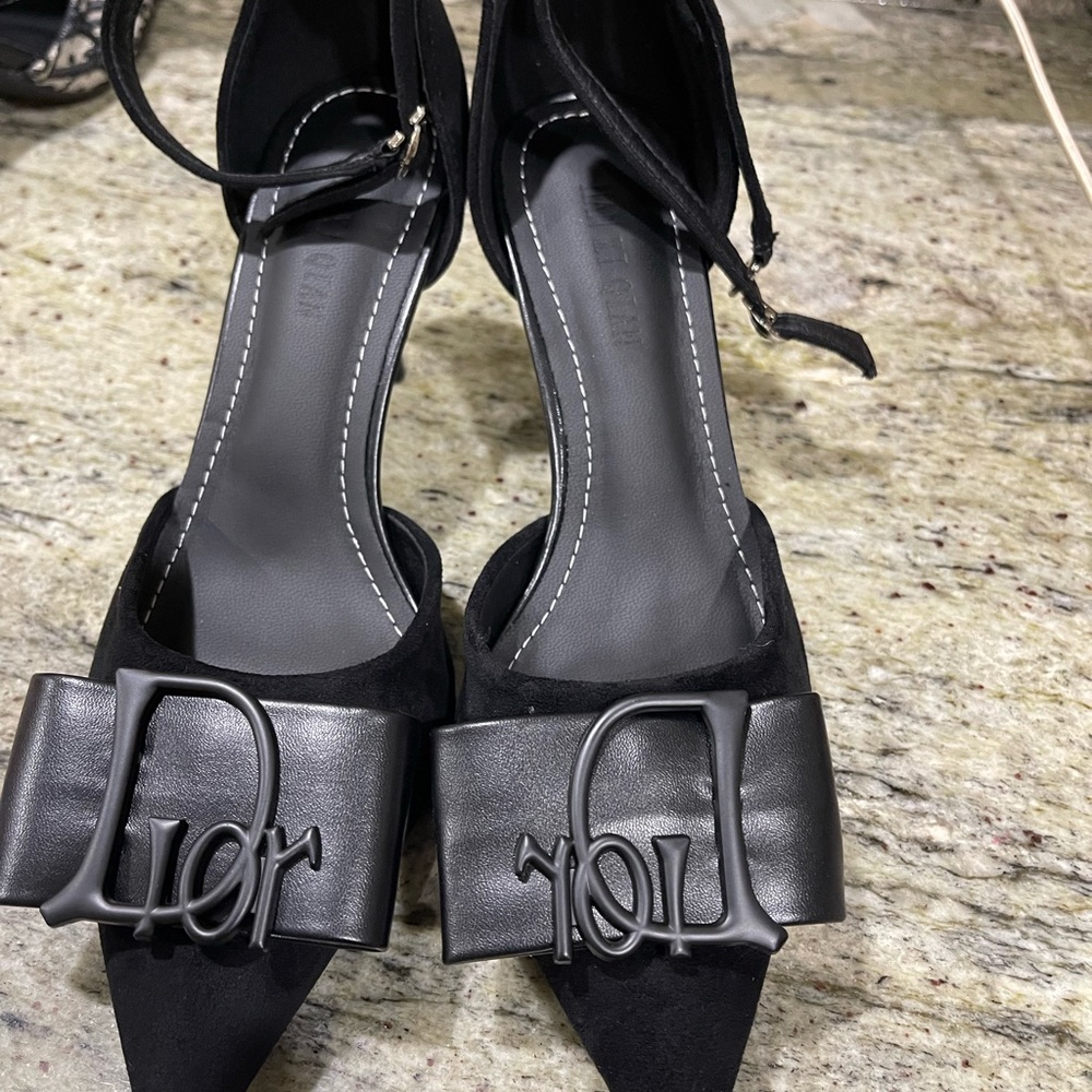 Dress up for the office in this black elegant black heel.